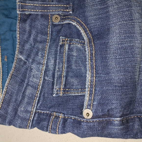 PAIGE Blue Jean Shorts with Distressed Hem - Picture 12 of 13